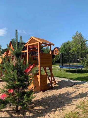 Фото номера Шале с двумя спальнями Лоджи Drewniany Domek - Jelonkowo г. Dominikowo 14